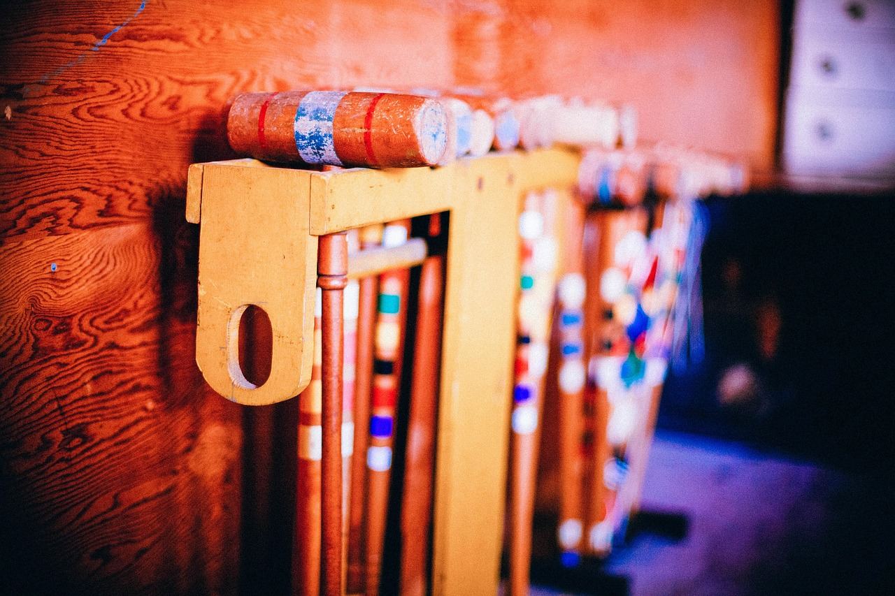 Striped mallets racked in a clubroom