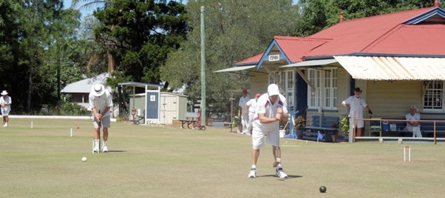 Members playing on the lawn in front of the Stephens clubhouse